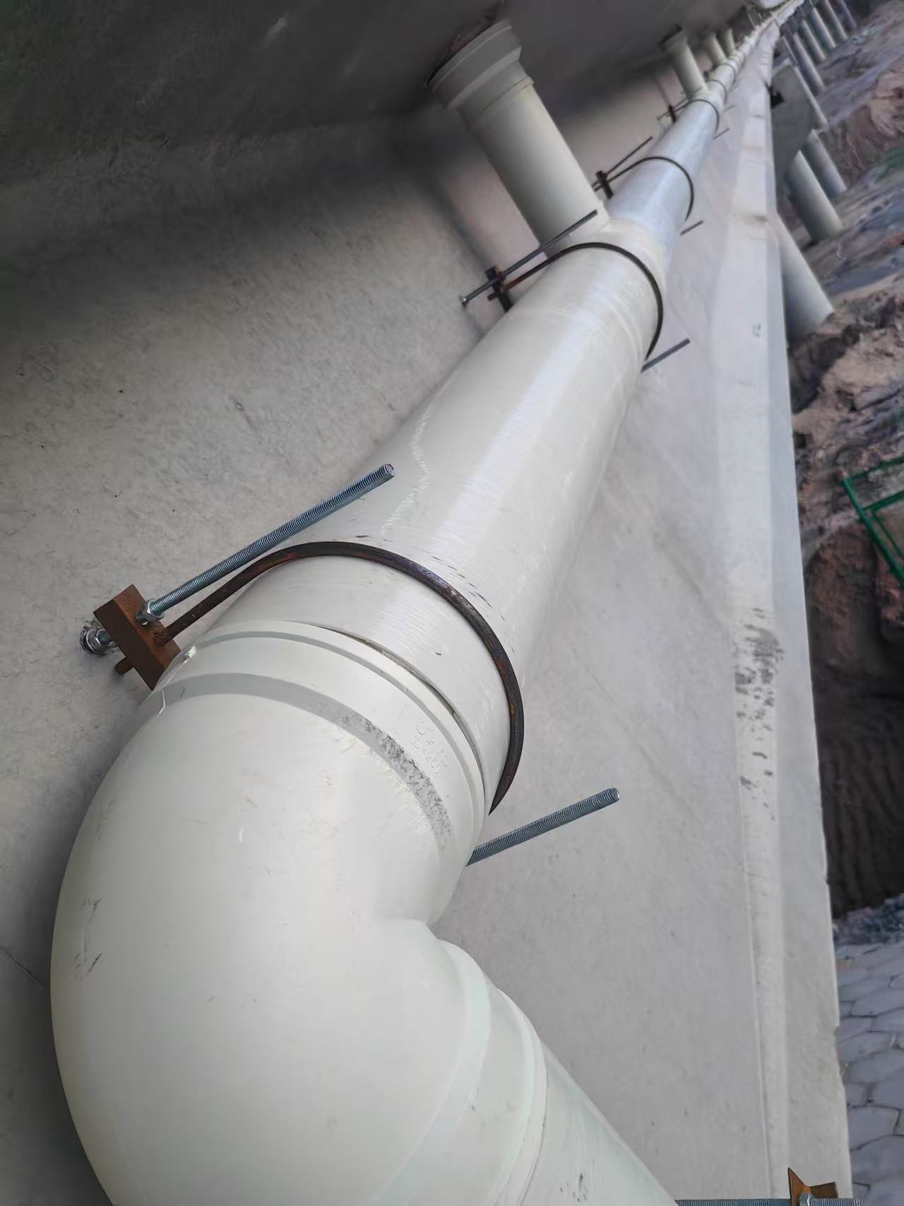 Bridge PVC drain pipe clamp installation